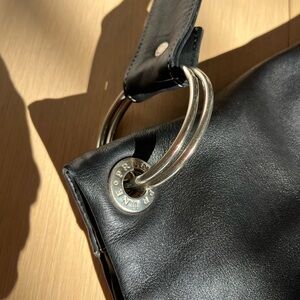 Prune Black Shoulder Bag with Silver Accents and purple lining